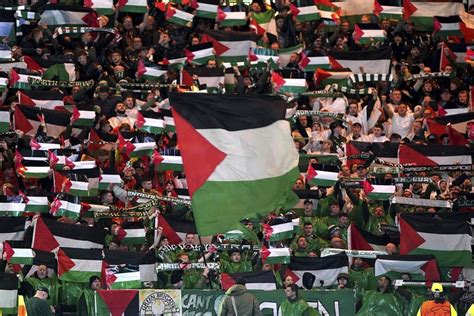 Palestinian flags displayed by fans of Scottish club Celtic at Champions League game draws UEFA fine