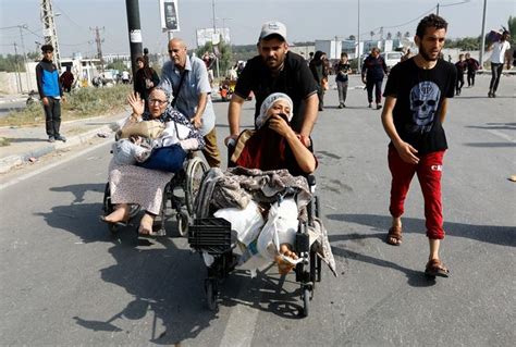 Palestinians stream out of combat zone in north Gaza as Israel opens window for safe passage