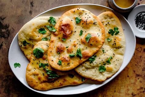 Palindromic Indian flatbread - Daily Themed Crossword. H