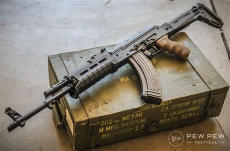 The rifle is finished with a Magpul polymer handguard, Ma