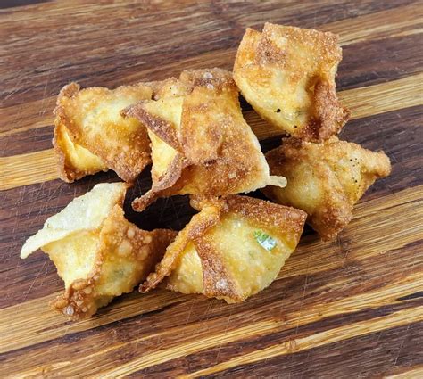 Panda express crab rangoon. Step 4: Heat the oil. Add about 3 inches of oil to a pot. Heat to 350°F, and adjust the heat to maintain that temperature. Advertisement. Image Credit: Jackie Dodd. 