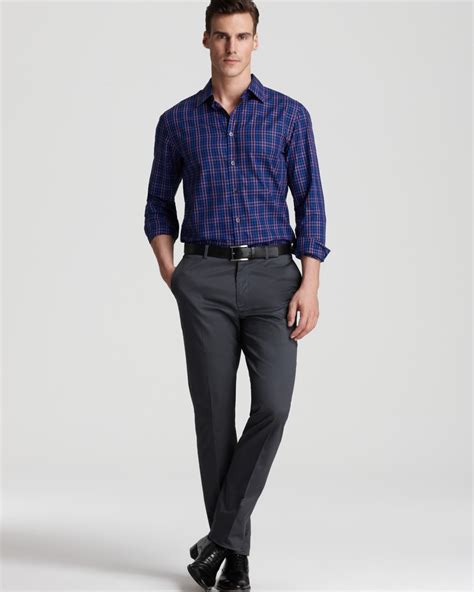 Pant shirt. A purple shirt can be worn with neutral-colored pants such as light grey, charcoal, khaki, navy, or black in dressy situations. In more casual settings, consider a purple shirt with burgundy, hunter green, or light blue pants instead. That’s the gist, but as always, there’s so much more to it. After going through a few essential tips for ... 