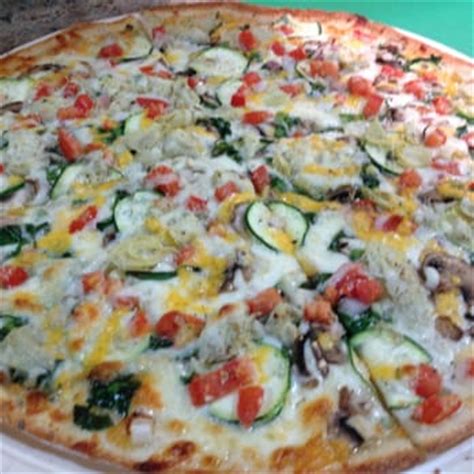 Gourmet Vegetarian. Spinach, Zucchini, Mushrooms, Marinated Artichoke Hearts, Roma Tomatoes, Mixed Onions, Cheddar, Herb & Cheese Blend, Whole-Milk Mozzarella, and Creamy Garlic Sauce. Enjoy our Gourmet Vegetarian Pizza with creamy garlic sauce, spinach, zucchini, mushrooms, marinated artichoke hearts, Roma tomatoes and mixed …