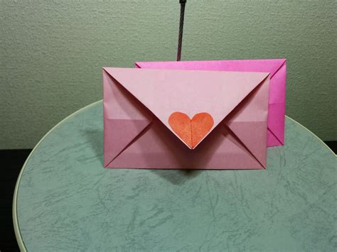 Paper envelope. Watch this video to learn how to make an easy origami envelope! You can make some really nice handmade origami letters. 💌 This looks like an envelope that y... 