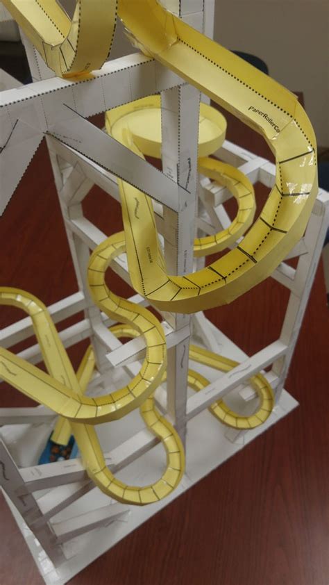 Paper roller coaster. Watch this video to learn how to build a vortex or funnel-shaped tracks for paper roller coasters made for marbles. Music: https://www.bensound.com 