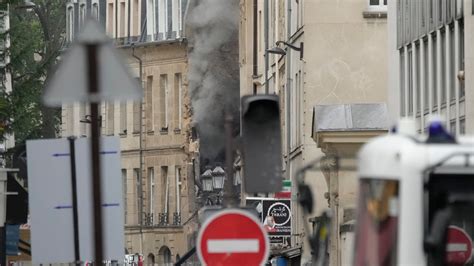Paris firefighters battle blaze spewing smoke over Left Bank, after reported explosion
