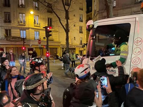Paris police and protesters clash for third night over Macron's pension