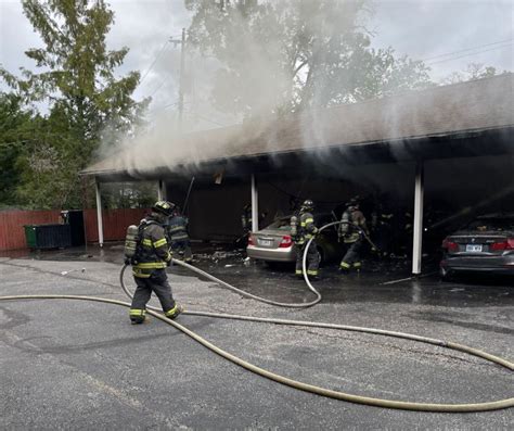 Parked BMW involved in KCFD fire investigation after carport is destroyed