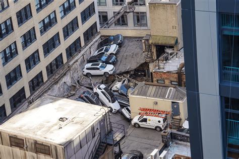 Parking garage collapses in Lower Manhattan; reports of people trapped inside