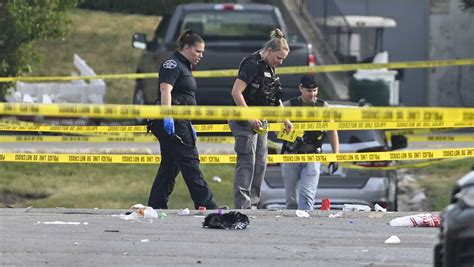 Parking lot party shooting leaves 1 dead and 22 people hurt in suburban Chicago