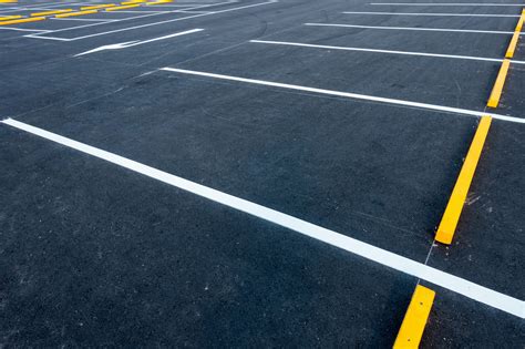 Parking lot stripping. You’re in a crowded supermarket parking lot. You have your turn signal on, patiently waiting for one person to back out of their spot so you can finally park and get on with your s... 