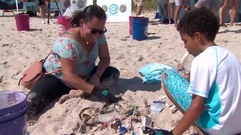 Participants at Plastic Fishing Festival in Surfside turn beach litter into art