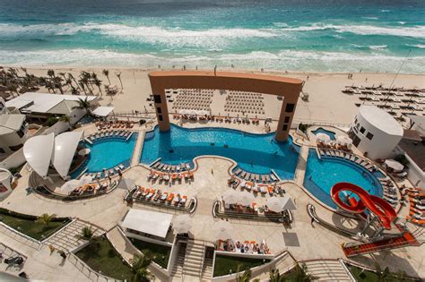 Party resorts in cancun. Feb 26, 2023 · 14. Golden Parnassus Resort & Spa. The pool overlooks the Caribbean Sea at Golden Parnassus Resort & Spa. Golden Parnassus Resort & Spa Cancun is a sprawling all-inclusive resort located in Cancun, Mexico. The resort is exclusively for adults and offers luxe rooms with private balconies and 24-hour room service. 