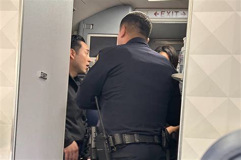 Passenger detained at LAX after opening emergency exit door, police say