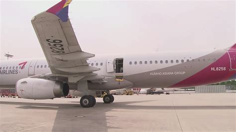 Passenger opens airplane door mid-flight in South Korea; 12 suffer minor injuries