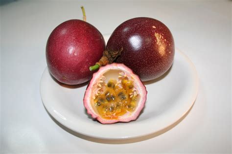 Passion Fruit Nutrition Facts. One cup of passion fruit (236g) provides 229 calories, 5.2g protein, 55.2g of carbohydrates, and 1.7g of fat. Passion fruit is a great source of vitamins A and C, iron, magnesium, and potassium. The following nutrition information is provided by the USDA for purple passion fruit. Calories : 229.