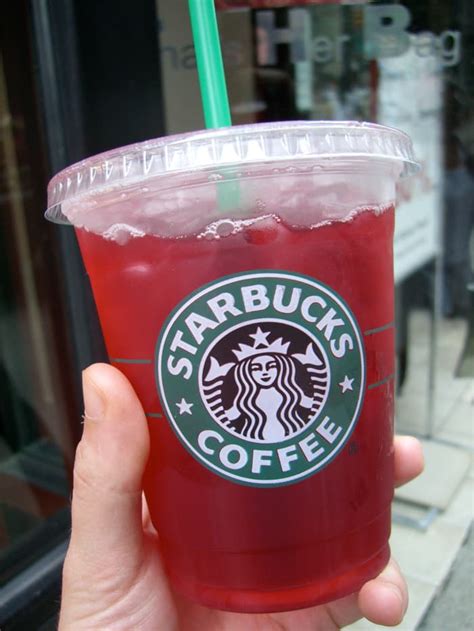 Passion tea starbucks. Instructions. Add a bag of passion tea to 1/2 cup cool water, then let sit for 5 min. Add dried strawberries to a large glass, then a handful of ice. Top with passion tea, grape juice, sparkling water and coconut milk. Serve and enjoy! 