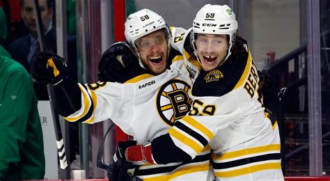 Pastrnak hits 50-goal mark as Bruins top Canes in shootout