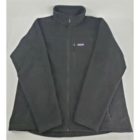 Patagonia 51884. Hi, I need help. I think the jacket I bought off eBay is a fake. The style tag says PO: 354140 STY84212FA19 BLK RN# 51884. The first indicator that it might be a fake was the tag saying blk. Also it does not have a zipper garage nor does it have any lining in the jacket. Also the hood is not removable and it has the inner collar. 