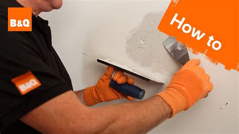 Patching plaster. Run strips of self-adhesive fiberglass drywall tape around the edges of the patch, centering the tape on the seams. Use a 6-inch drywall knife to spread drywall joint compound across the patch and tape to create a smooth, flat surface. Let the compound dry overnight, then sand until smooth. Repeat with a second coat. 