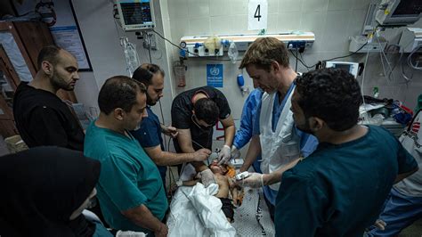Patients and staff leave Gaza’s biggest hospital, and dozens are killed at a crowded refugee camp