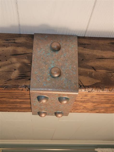 Patina carriage bolts.  Good luck getting through this horrible video Click...