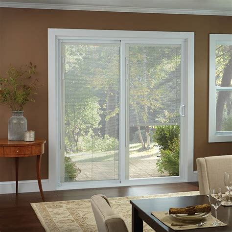 Patio doors with built in blinds. 72 in. x 80 in. Smooth White Left-Hand Composite PG50 Sliding Patio Door with Low-E Built in Blinds. Add to Cart. Compare. Top Rated. Expert Installation Available $ 1388. 00 (137) Stanley Doors. 71 in. x 80 in. Glacier White Vinyl Left-Hand Low-E Sliding Patio Door with Screen, Handle Set and Nailing Fin. 