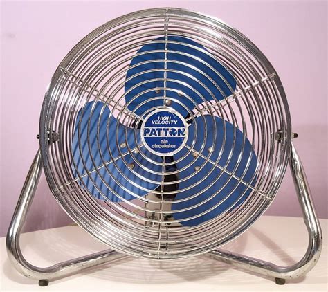 This auction is for a used vintage Patton electric 2 speed fan. It is operated by 115v, 60cy, and 1.5 amps. It is made entirely of steel except for the aluminum blade. It measures 16-1/2" tall. The cage measures 13-3/4" diameter x 6" deep. It weighs about 9 pounds. The fan can be raised or lowered by tilting on the stand.. 
