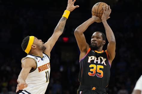 Paul makes 7 3s, Suns beat Nuggets for 7th straight win