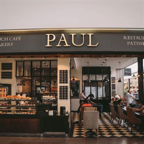 Paul restaurant and bakery. Ideally I'd give 3.5 stars. PAUL is a posh French-style cafe with a split business model: counter-service cafe in the front with coffee, pastries, and light meals, and full-service restaurant in the back with bigger meals The interior is clean and very nicely designed and they even have a door person. 