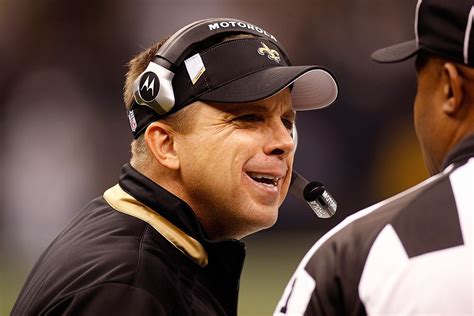 New Orleans Saints head coach Sean Payton and New quarterback Drew Brees (9) share a moment after Brees threw a touchdown pass surpassing Peyton Manning's record for most touchdown passes during an NFL game against the Indianapolis Colts, Monday, Dec. 16, 2019, in New Orleans. The Saints defeated the Colts 34-7. (Margaret Bowles via AP). 