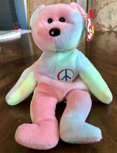 TY Peace Beanie Babies bear, Original, 1st Edition, 1996 - Style 4053. ** First Edition features include: *** PVC Pellets (1st Edition) ***No stamp inside tush tag (indicates early generation/prior to mass production) ***Fareham, Hants (rare collectible/highly sought after) ***Tush tag has REG NO PA 1965 (KR) which means that …