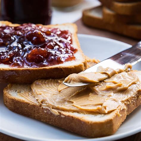 Peanut butter and butter sandwich. Ingredients · 8 slices country white bread · 2 tablespoons butter · 1/2 cup peanut butter · 4 to 6 ounces semisweet chocolate, coarsely chopped or broke... 