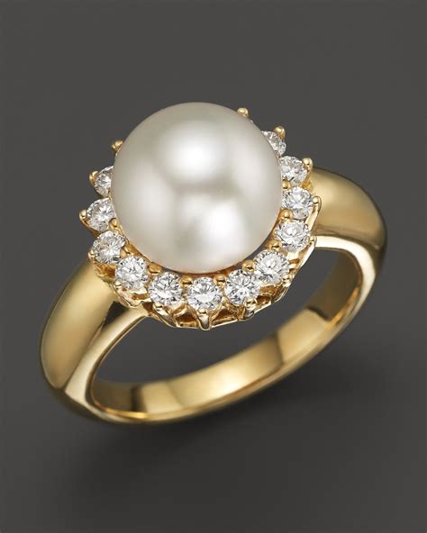 Pearl and diamond ring. Part of the Modern Pearl Collection by Landing Company - Genuine freshwater pearl & prong set round diamonds - High polish finish - Total carat weight: .06 ... 