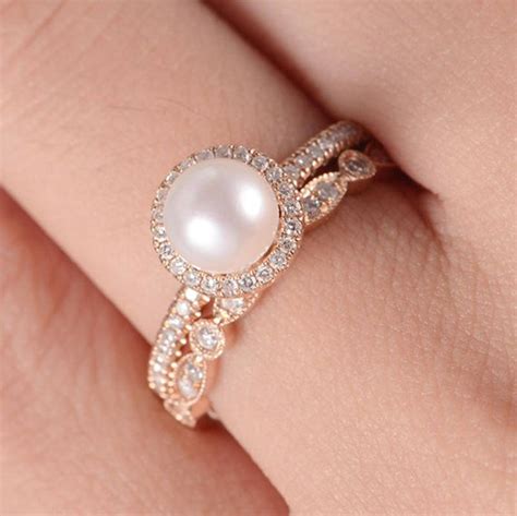 Pearl engagement rings. 5.8mm Freshwater Pearl Ring Engagement Women's Wedding Ring Pearl CZ 925 Sterling Silver Round Shape Ring (3.3k) Sale Price $16.99 $ 16.99 $ 19.99 Original Price $19.99 (15% off) FREE shipping Add to Favorites Black Pearl Ring, Blue Peacock Pearl Ring, Boho Gemstone Ring, June Birthstone Ring, SINGLE RING ... 