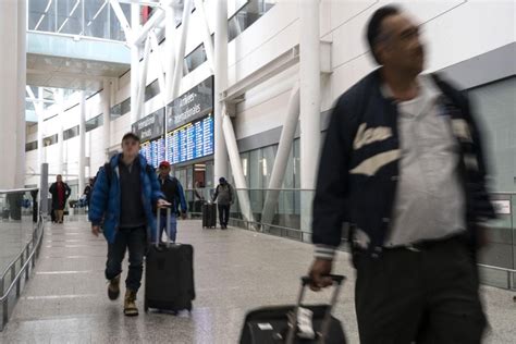 Pearson airport says 10,000 new hires, better technology have improved service