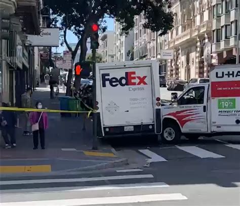 Pedestrian dies after runaway U-Haul barrels into FedEx truck in Tenderloin crash