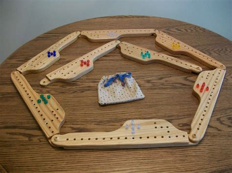 Pegs And Jokers Game Board Pattern Gameita