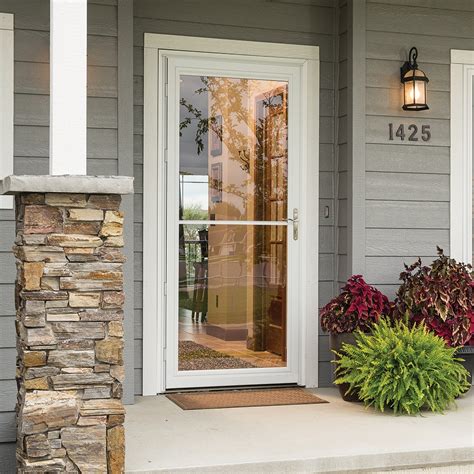 Shop LARSON Tradewinds Selection Low-E 36-in x 96-in White Full-view Retractable Screen Aluminum Storm Door in the Storm Doors department at Lowe's.com. Let in light and fresh air with LARSON Screen Away® Storm Doors. Screen Away® storm doors from LARSON have become the top choice for homeowners. The built-in