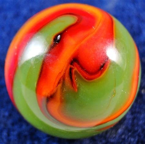 Peltier marble identification. Yes, the 2nd marble is also a Peltier Rainbo. Rainbos can be found in near infinite color combinations. Peltier marbles can be found in a range of sizes, from 1/2" peewee to 1" 