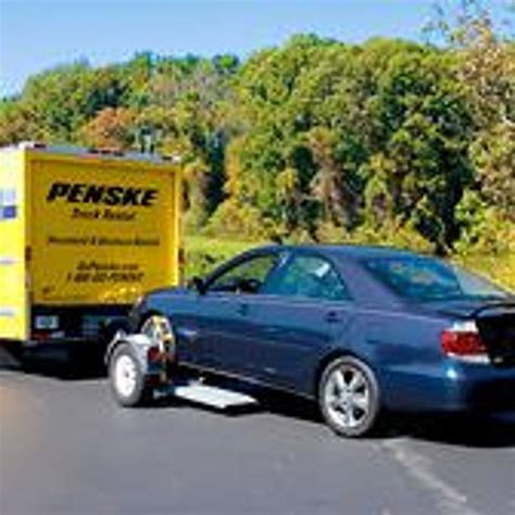Haven't used Penske, but a Uhaul car carrier/auto 