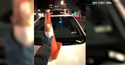 People place cones on empty driverless cars in SF