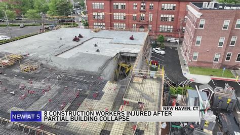 People trapped after building under construction partially collapses near Yale University campus, authorities say