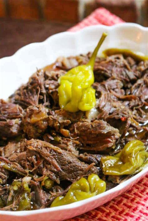 Pepperoncini roast. Jan 8, 2019 · Remove roast and shred with 2 forks. Blend au jus mix with a little of the liquid from slow cooker until dissolved; stir back into liquid in slow cooker. Add peppers and onion. . Return shredded beef to pot. Add beef broth if needed to keep meat moist, barely submerged. Cover and cook for an additional 30 minutes. 
