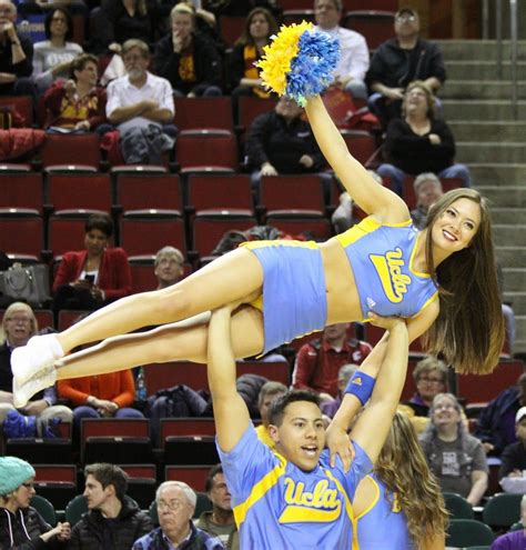 Cheerleader Girl falling from Human Pyramid Group. of 100. Browse Getty Images' premium collection of high-quality, authentic Cheerleader Pics stock photos, royalty-free images, and pictures. Cheerleader Pics stock photos are available in a variety of sizes and formats to fit your needs.. 