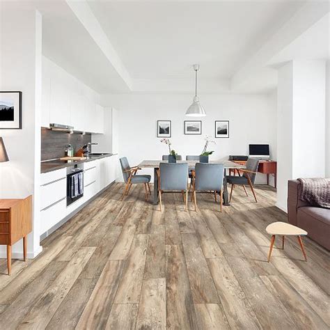 Pergo brentwood pine. These stunning, custom-look planks feature multiple tones of beige, brown and muted grey for the appearance of authentic weathered pine. Like all Pergo® floors, this floor comes with a click-lock system for easy DIY installation and can be installed on any grade — including basements. 