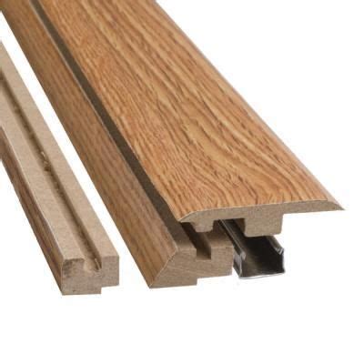 Pergo flooring transition strips. Lowe's Project Source floor mouldings for Pergo DuraCraft Champagne Oak are Vinyl Multi-Transition, 5129367 - Qtr Rnd, 5129383 - Vinyl Stairnose, 5129427 - Waterproof Qtr Rnd, 3674489 - White Qtr Rnd, 1255399 - White Wallbase, 1255400. Guaranteed not to gap if exposed to moisture or temperature changes. Installs on all grades 