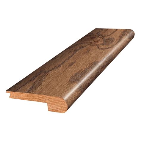 SimpleSolutions. Old Drift Oak .66-in T x 2.14-in W x 84-in L Wood Multi-purpose Floor Moulding. • Provides one solution for four different moulding needs — hard surface reducer, T-moulding, carpet transition and end moulding. • Assembles in seconds, simply align the parts and snap into the track.