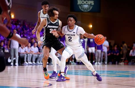 Perry scores 24 points and Kansas State edges Providence 73-70 in overtime in Bahamas