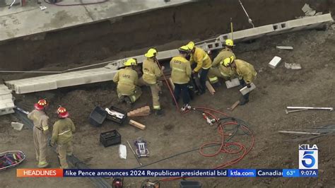 Person trapped under concrete wall in Pacoima
